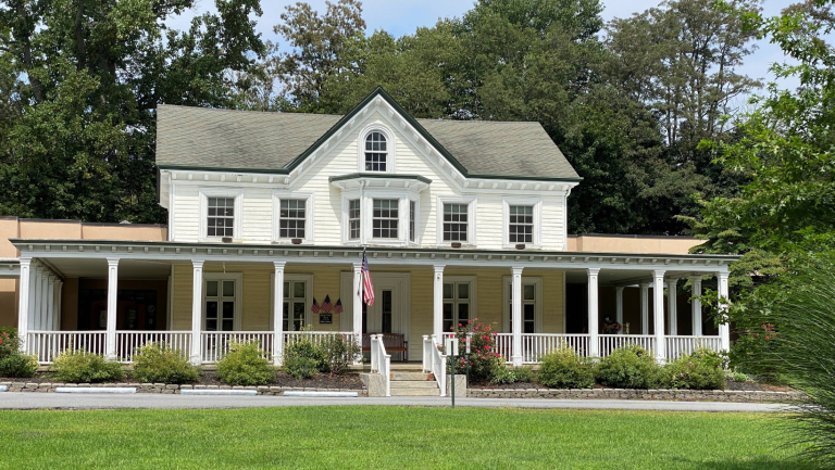 An image of the front of the library from the yard.